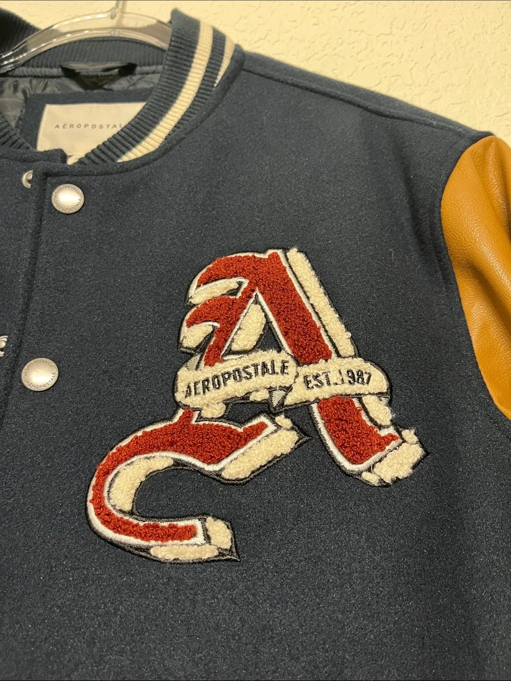Aeropostale Men’s XS Varsity Jacket With Navy Blue Wool and Tan Leather Sleeves